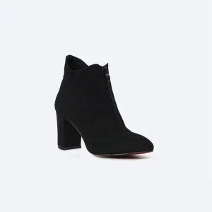 ZAHWA black suede heeled ankle boot side view with zipper closure