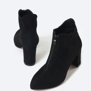 Pair of ZAHWA black suede heeled ankle boots for women