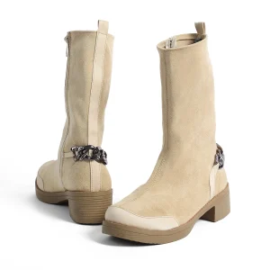 Pair of ZAHWA off white elastic suede high ankle boots with chain detail