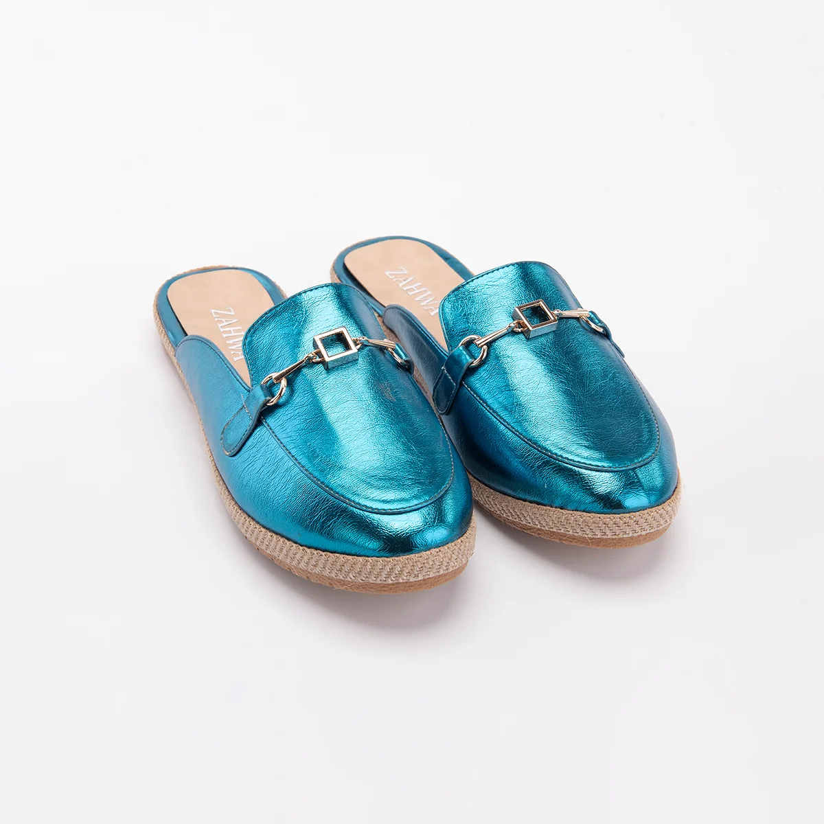 Aqua metallic flat mule for women with elegant horsebit hardware and comfortable slip-on styling