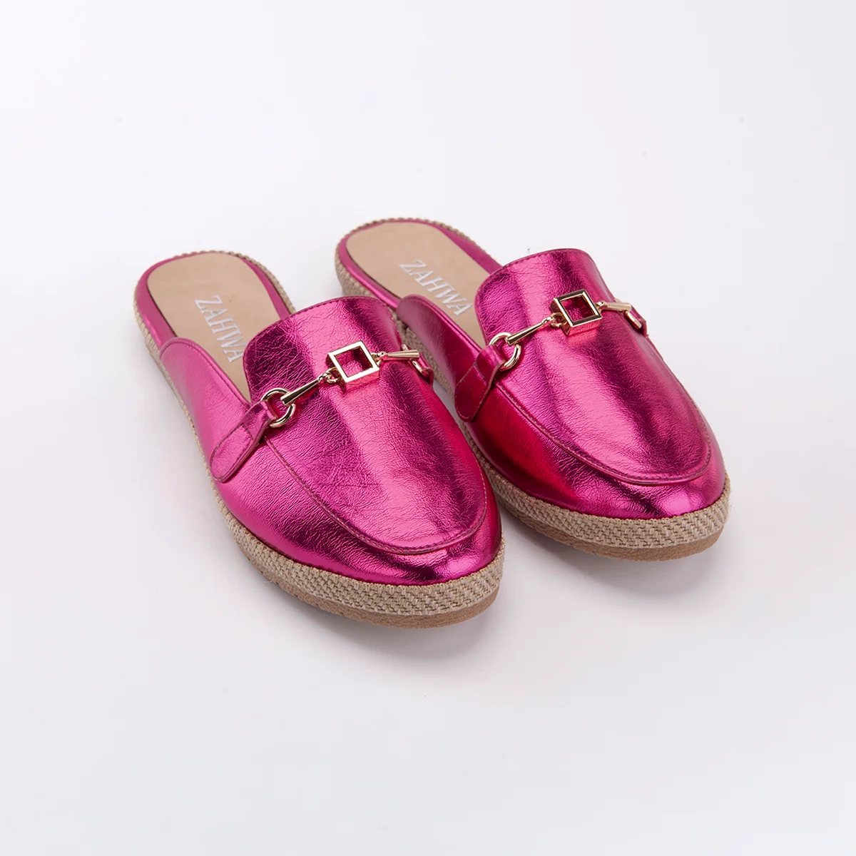 Fuchsia metallic flat mule for women featuring elegant horsebit hardware and a comfortable slip-on design
